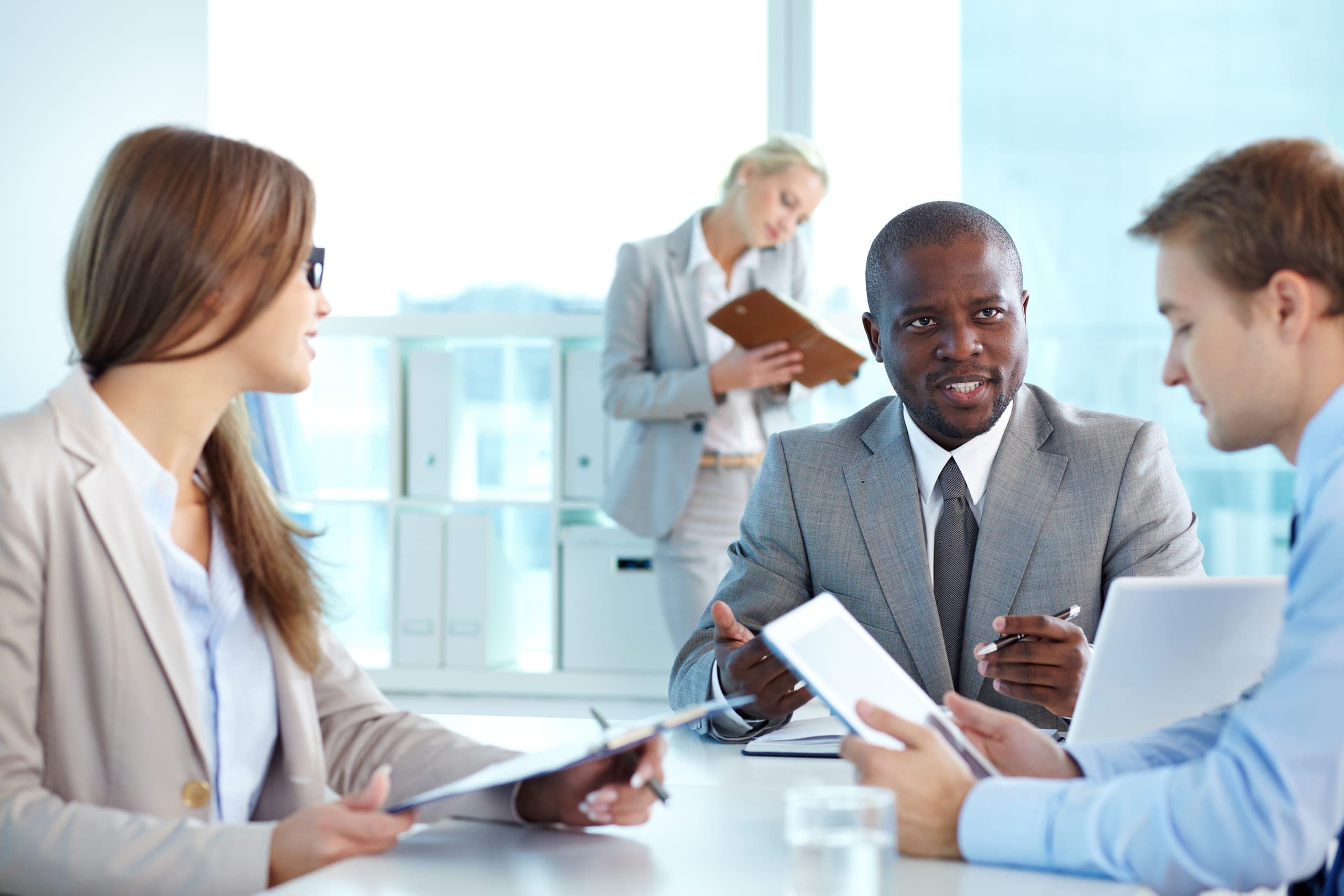 Lidao consultants discussing a programme in a meeting